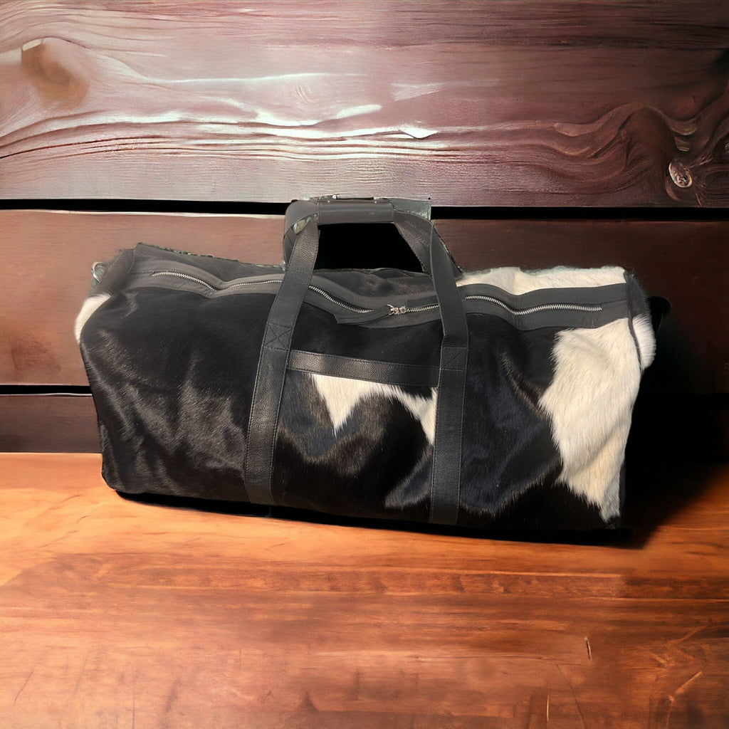Cowhide Duffle Bag - Black and White Cowhide and Conchos
