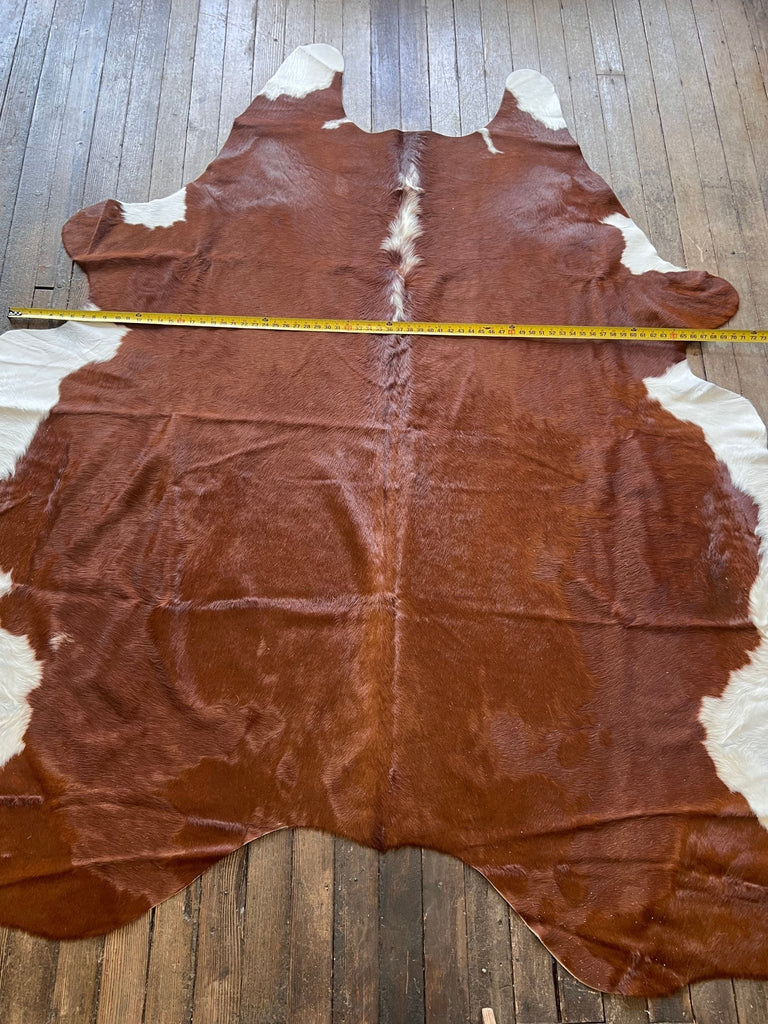Cowhide Rug - 8' by 6' Cowhide and Conchos