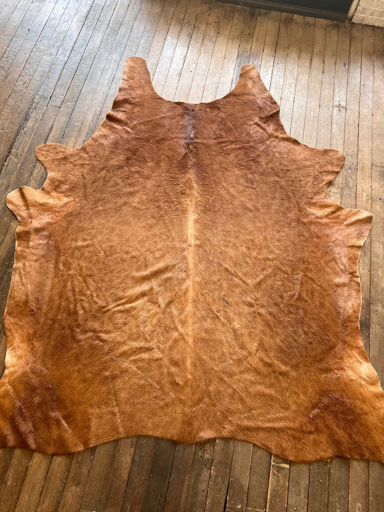 Cowhide Rug - 8' X 6' Cowhide and Conchos