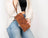 Majeste Leather Clutch Bag Mizuri Leather