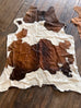 Cowhide Rug - 6.5 ft by 4.5 ft. Cowhide and Conchos